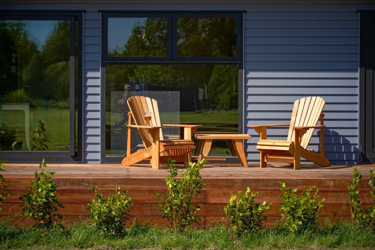 Parehua Resort Martinborough Exteriör bild A deck with A-frame chairs